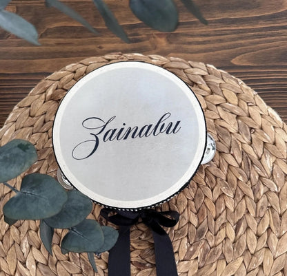 Customized tambourine patterns · High-quality cardboard drum surfaces · Stainless steel chime pieces · Stage performance instruments